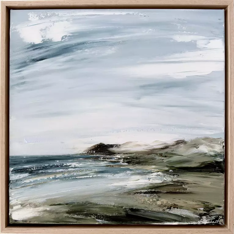 Overcast moody sky over ocean and rugged Australian coastline