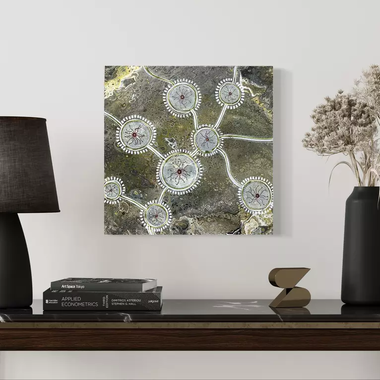 Organic shades of grey-green with markings in an aboriginal design