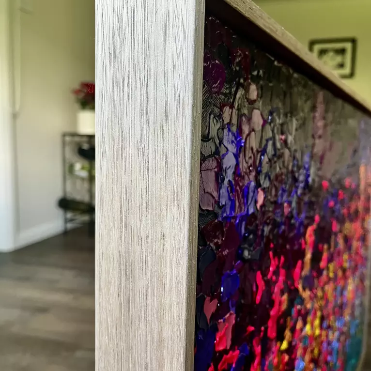 A burst of glossy lush colours thickly applied in a vivid display of nature moment of “Spring” — edge view