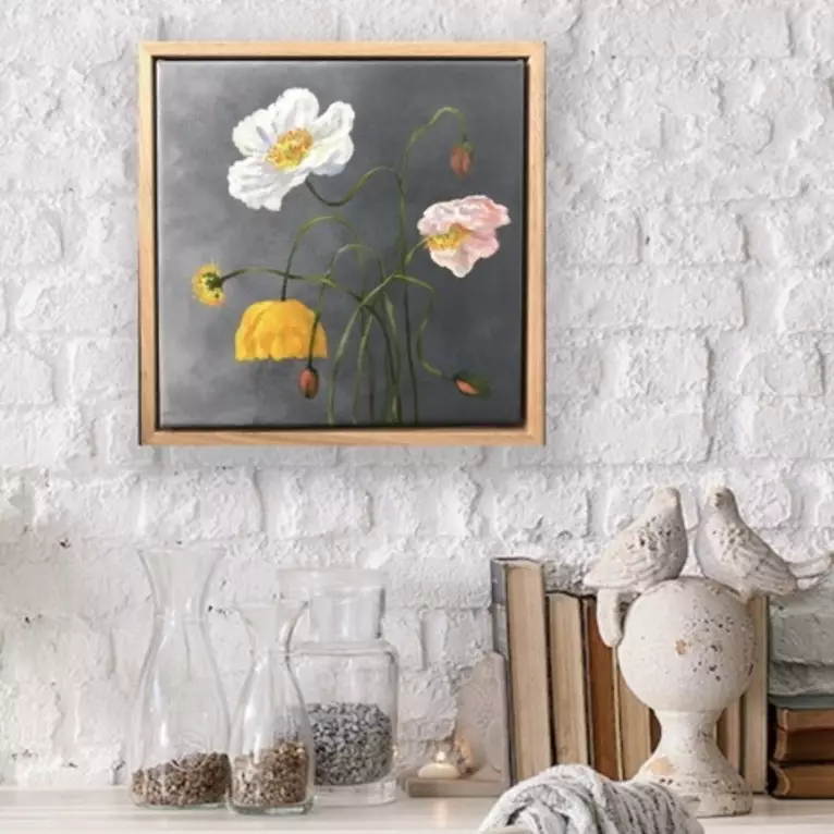 delicate Poppy flowers stems and buds — shown hanging