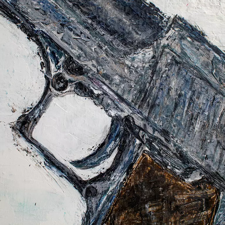 Gun on white background — edge view