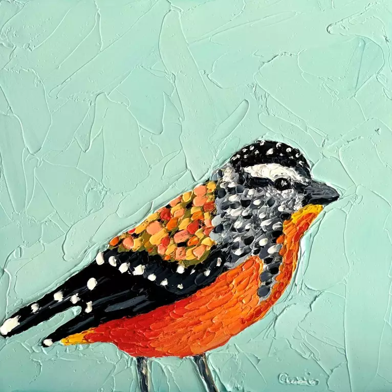 Small painting of an Australian Spotted Pardalote bird painted in textured oil paints.