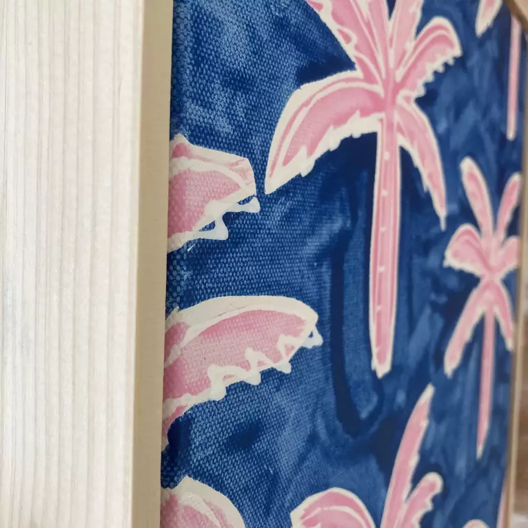 Many pink palm trees on a dark blue background — edge view