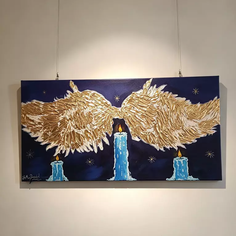 A striking original artwork featuring expansive golden angel wings stretching across a deep midnight-blue sk… — shown hanging