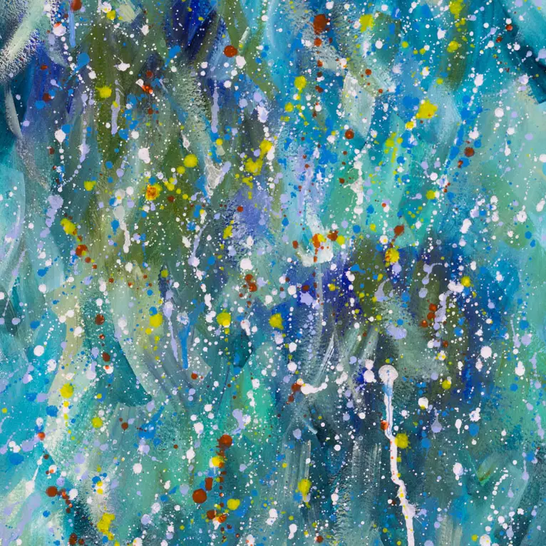 Multiple rain droplets falling with multiple hues of blue