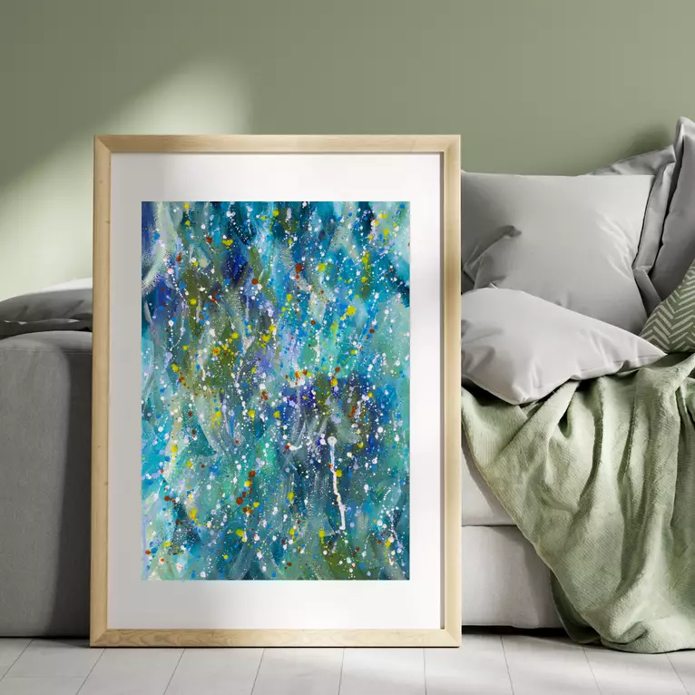 Multiple rain droplets falling with multiple hues of blue — shown hanging