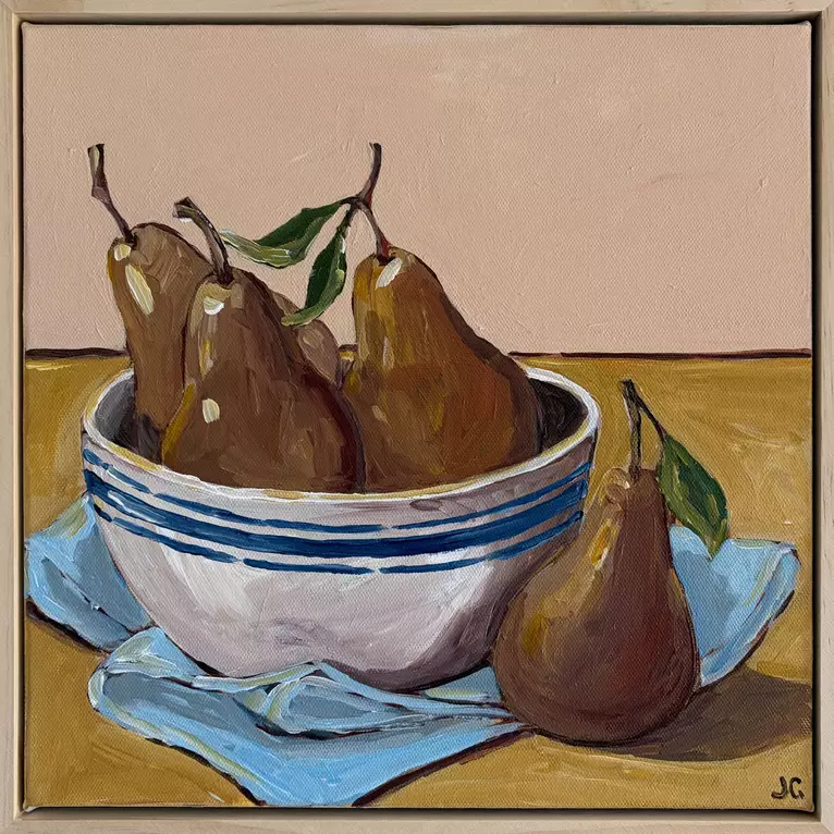 Pears in a bowl on a cloth