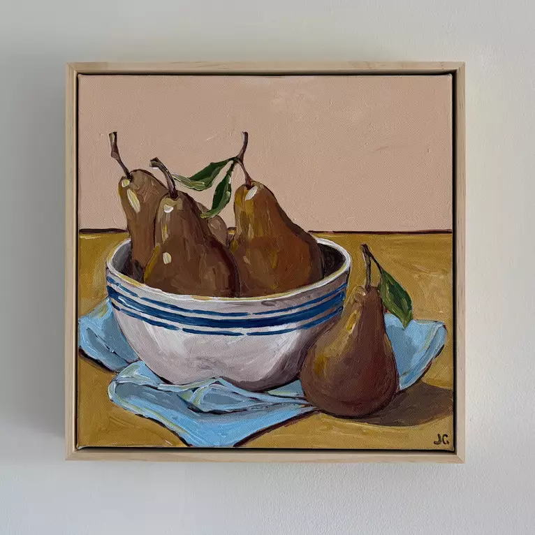 Pears in a bowl on a cloth