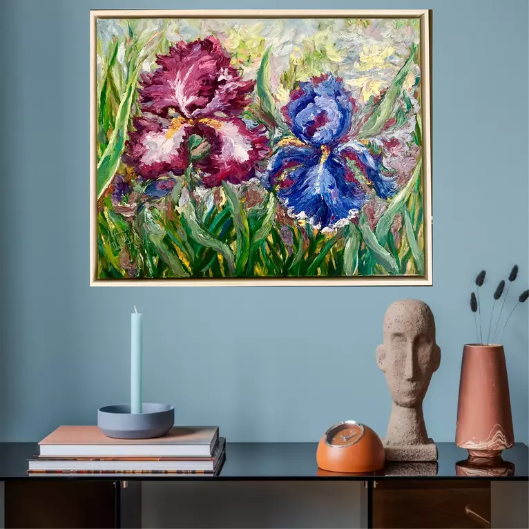 Pallet knife textured ruby red and saffire blue irises in cottage garden, framed in off-white wood. — artist's signature