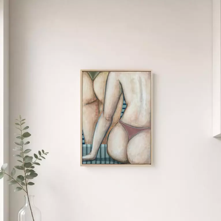 A framed painting of several nude figures close together, seen from behind and the side. Soft skin tones, one figure wearing…
