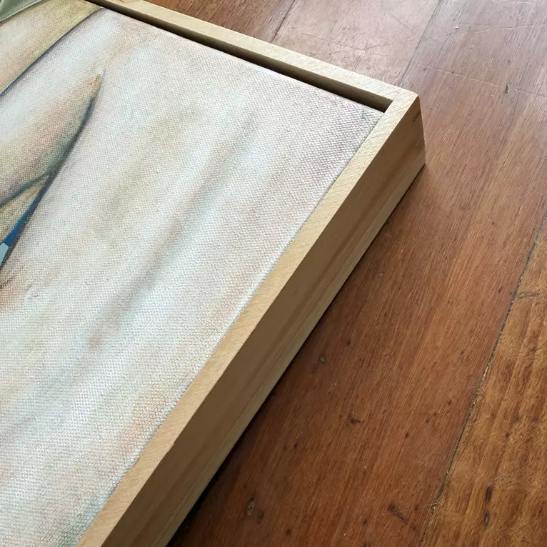 A framed painting of several nude figures close together, seen from behind and the side. Soft skin tones, one fi… — edge view