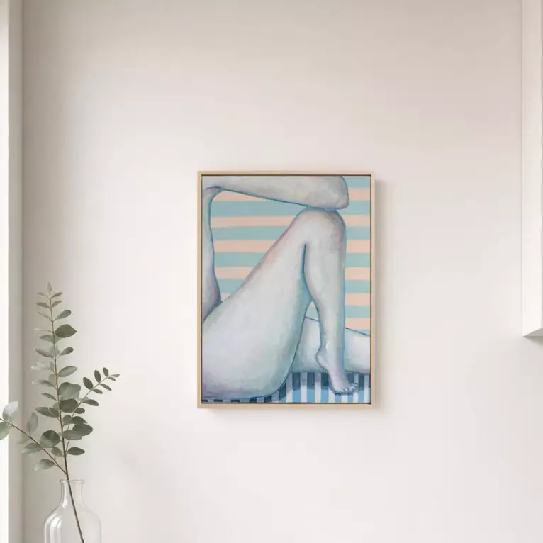 A framed painting of nude legs crossed, one over the other, with soft skin tones. Blue-grey and white horizontal stripes fil…
