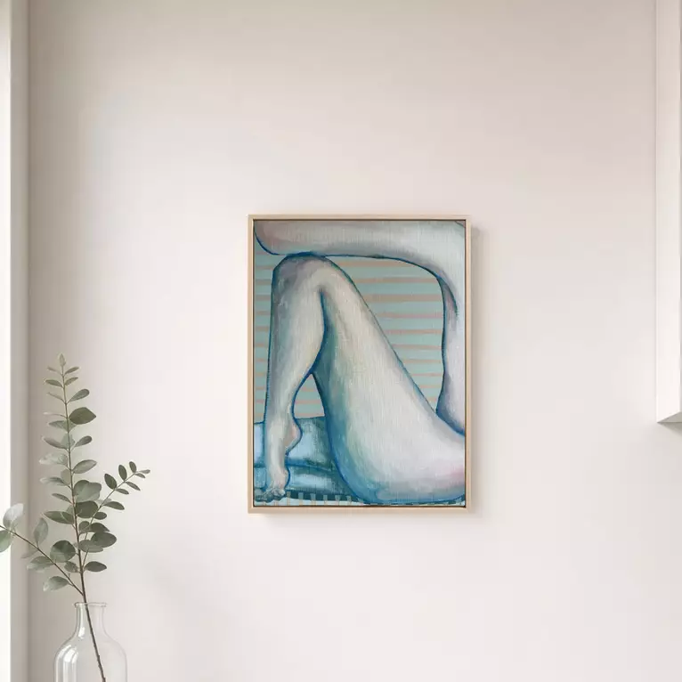 A framed painting of a nude figure curled on its side, legs bent and drawn up. Soft blue-grey skin against a background of p…