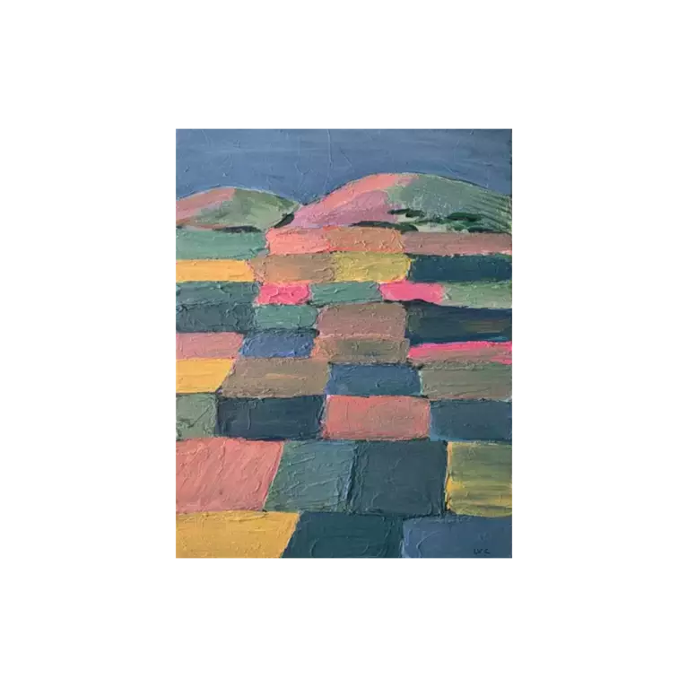 Coloured fields in pastel tones with mountains in the background. — shown in a room setting