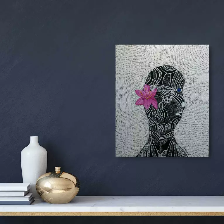 Tribal woman with a pink flower. — shown hanging