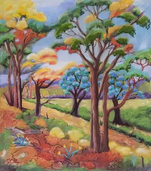 a lovely australian landscape under bluish skies with colourful foliage of the different eucalytpus trees, with shrubs and g…
