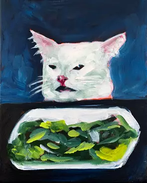 Cat at the table with mouth open
