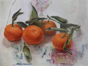 four mandarins arranged on abstracted tablecloth