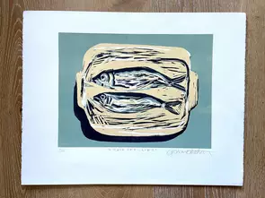 It is two fish in a ceramic cooking container
