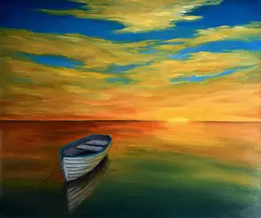 Brilliantly coloured sunset reflected in still water with white dinghy in foreground.