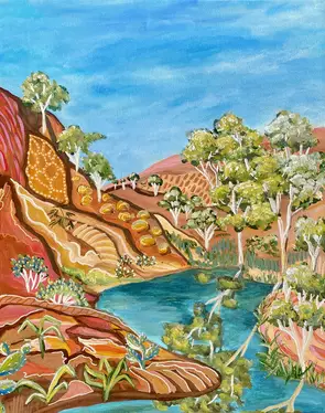 Blue water oasis framed by the deep rich coloured rocky landscape of the Australian outback. Native trees scattered through …