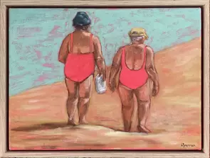 Two women in pink bathing suits walk on beach