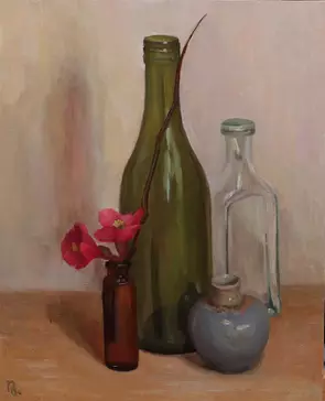 four different bottles/vases with a pink flower in an orange glass bottle