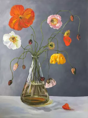 Bright Poppy flowers in a glass vase