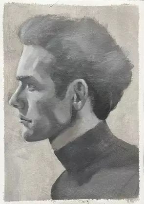 Black and white grayscale portrait of a man’s profile he is handsome