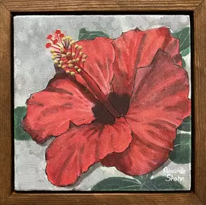 Red hibiscus with a mottled grey blurred background