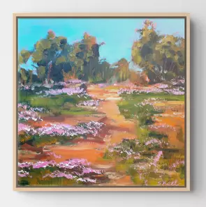 pink wildflowers on a rough track in the Pilbara region of WA