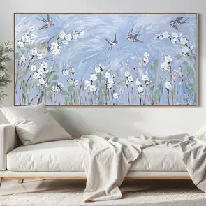 Thickly painted poppies and swallows on a stretched canvas.