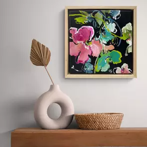small bright coloured abstract botanical painting with a black background and pink and green flowers