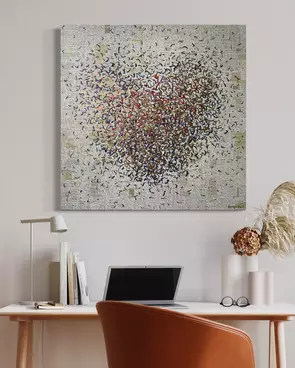 Abstract love heart against a backdrop of positive words, with golden metallic paint