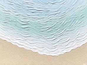 textured abstract textured wave coming onto the sand. Blue water with beige sand