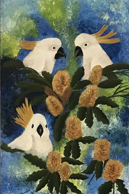 Three parrots in the tree at home