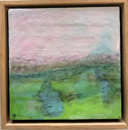 A soft, atmospheric encaustic wax and mixed media artwork in gentle layered textures, framed in natural timber. The surface …