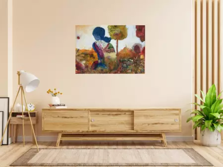A lady sits alone in a field of brightly coloured wildflowers facing the horizon under a creamy co… — shown in a room setting