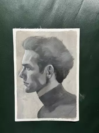 Black and white grayscale portrait of a man’s profile he is handsome — edge view
