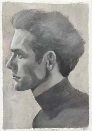 Black and white grayscale portrait of a man’s profile he is handsome