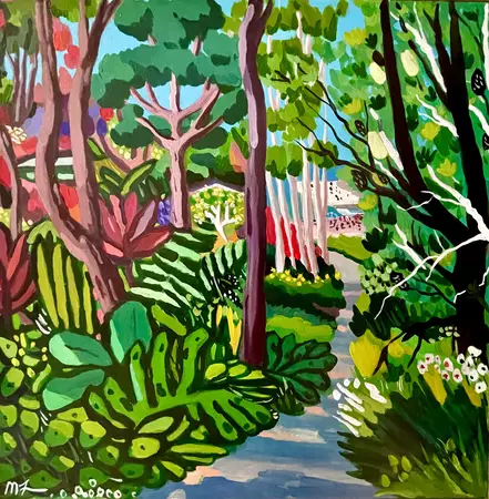 A bush track leading to Clovelly beach. On both sides of the of the track is gardens and natural bush. The sun is coming thr…