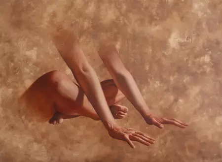 Seated figure with hands touching the ground.