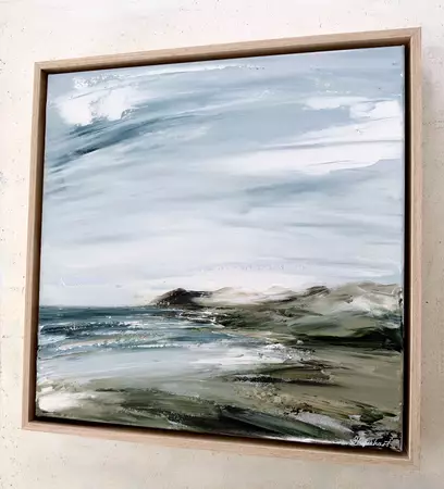 Overcast moody sky over ocean and rugged Australian coastline — edge view