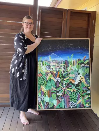 A garden with Australian natives displayed in simple shapes. Leading up to mountains with a Queenslander cottage… — edge view