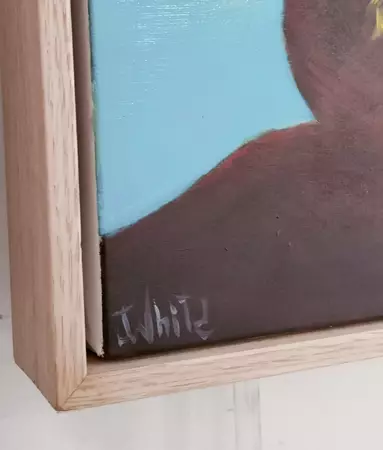 Two young people are silhouetted on a quiet lake Edge. — artist's signature