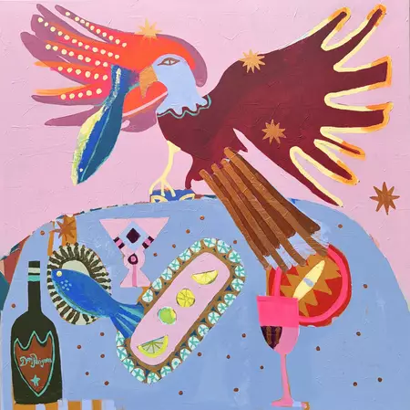 Bird of prey swoops to catch fish on a tablescape