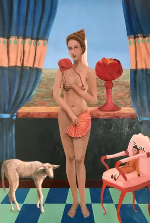 A woman standing in her bedroom next to a lamb and chair with a jester .