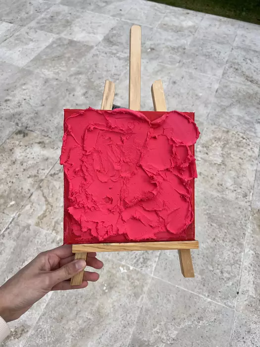 Pink on red textured artwork by Amber Rizvi